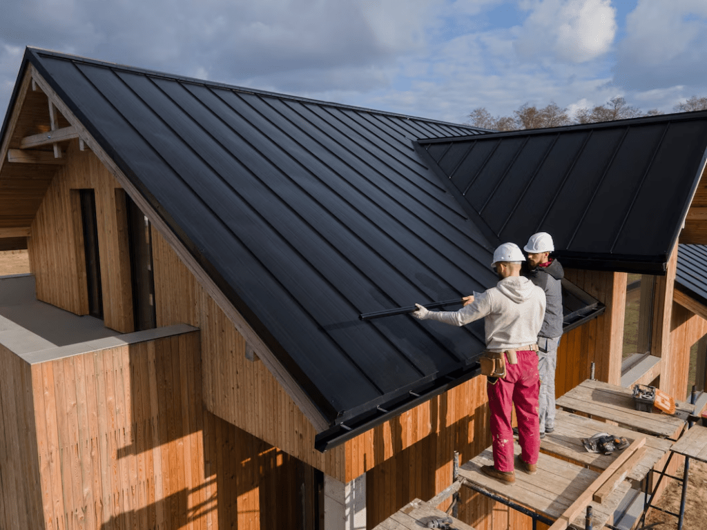 worker installing roof